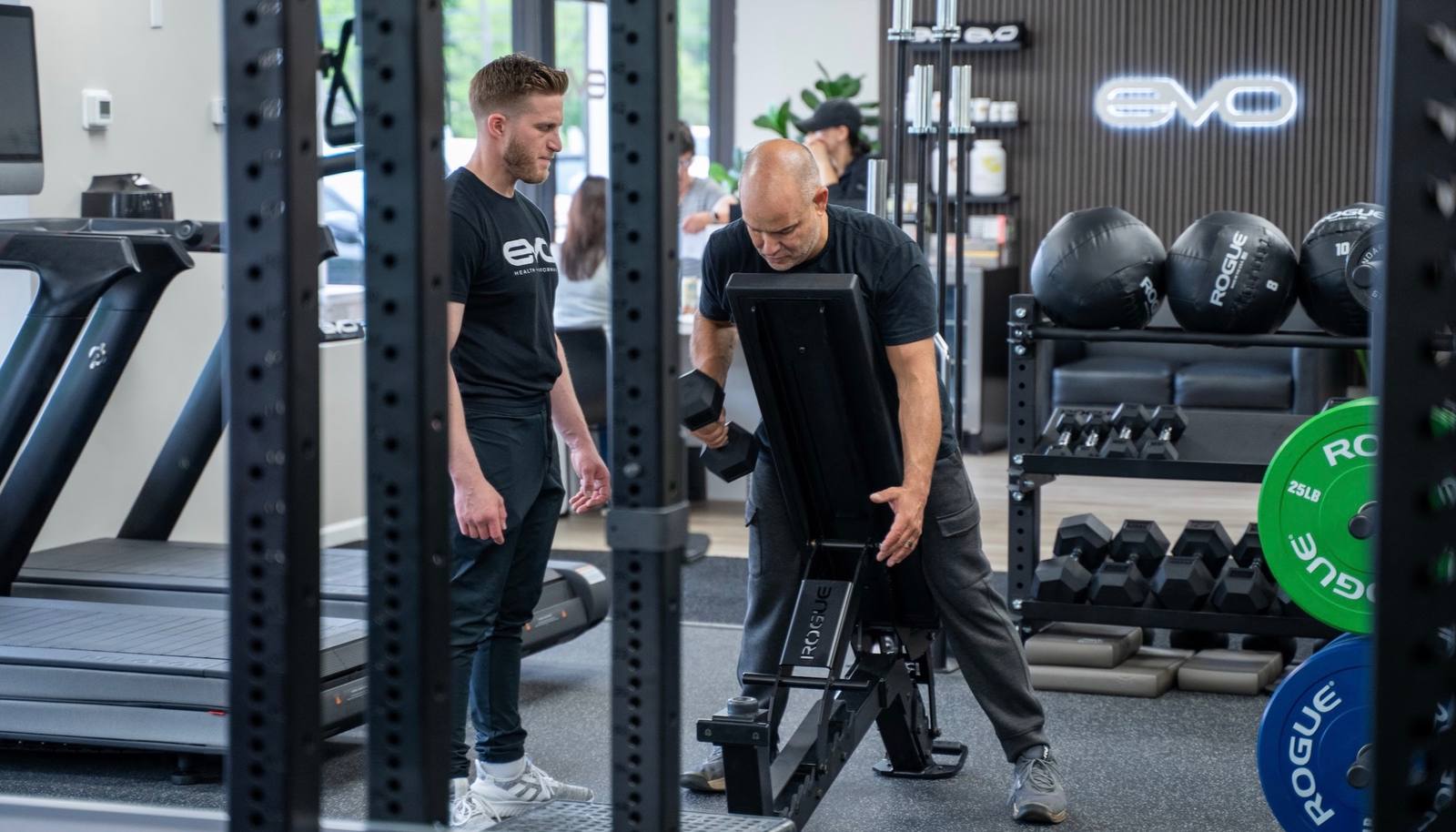 EVO coach guiding a client